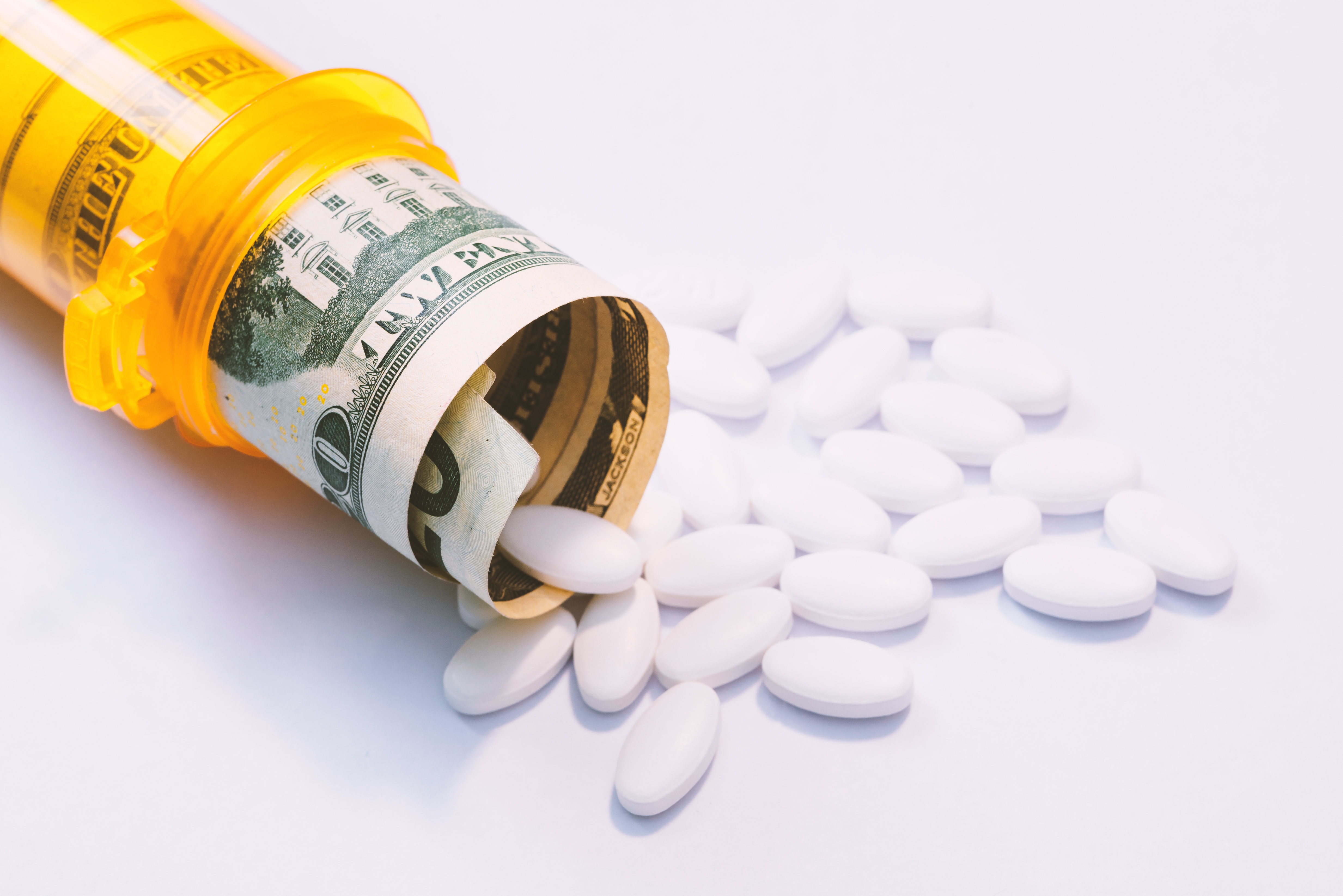 pill bottle dollars white pills